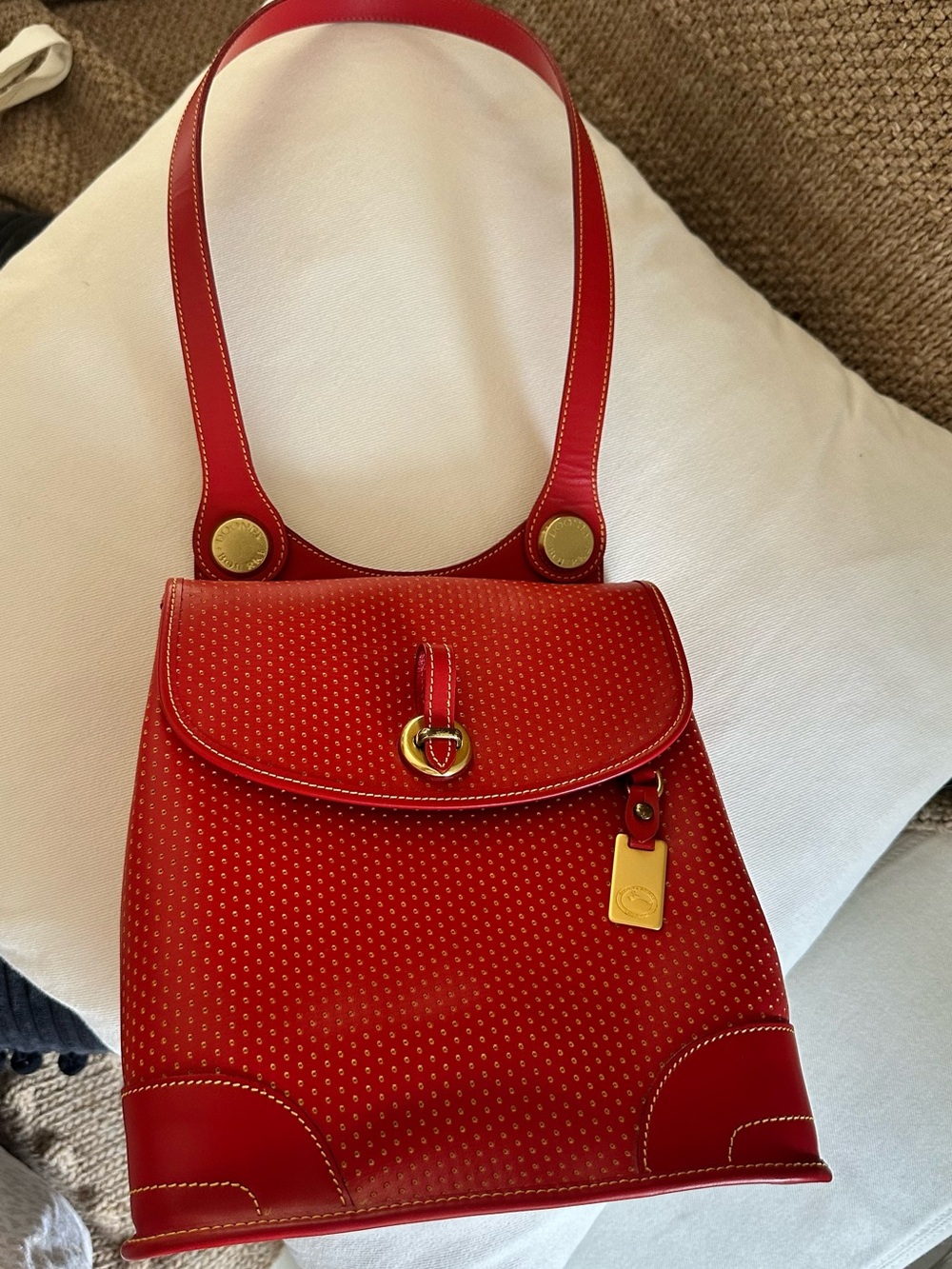 VTG DOONEY & BOURKE, perforated red leather body bag.